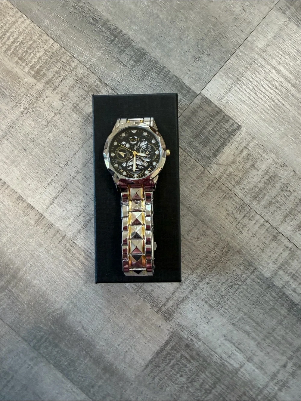 ORUSS Men’s Skeleton Quartz Watch Silver Tone Black Dial Stainless Steel Band